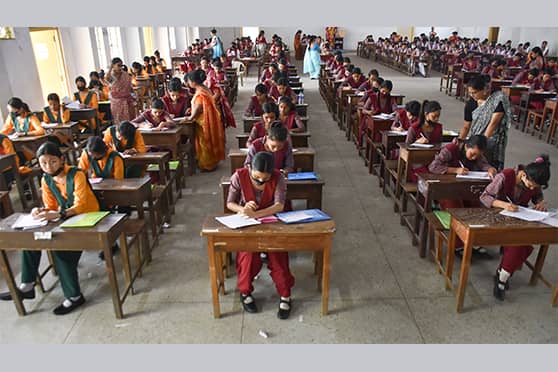 Students appear for the CBSE Class X examinations at a school in Agartala. 