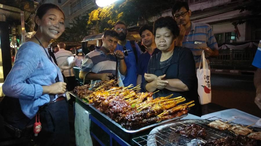 A food stall at a night market in Thailand
