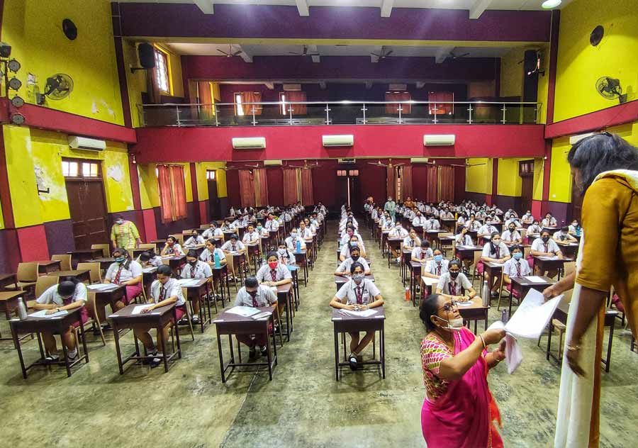 Teachers distribute the answer scripts on the first day of the ISC 2022 Semester 2 exams at Calcutta Girls’ High School on Tuesday. The ISC exams began with the English Language paper