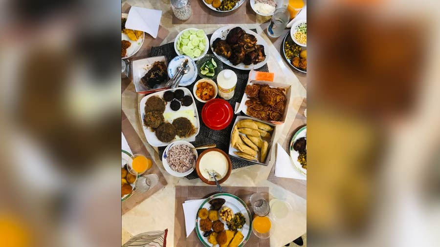 An iftar spread consisting of everything from doi and cheere to shami kebab and grilled chicken