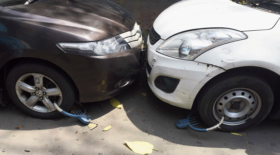 Several other cars were found clamped at the Triangular Park in New Alipore on Wednesday morning.