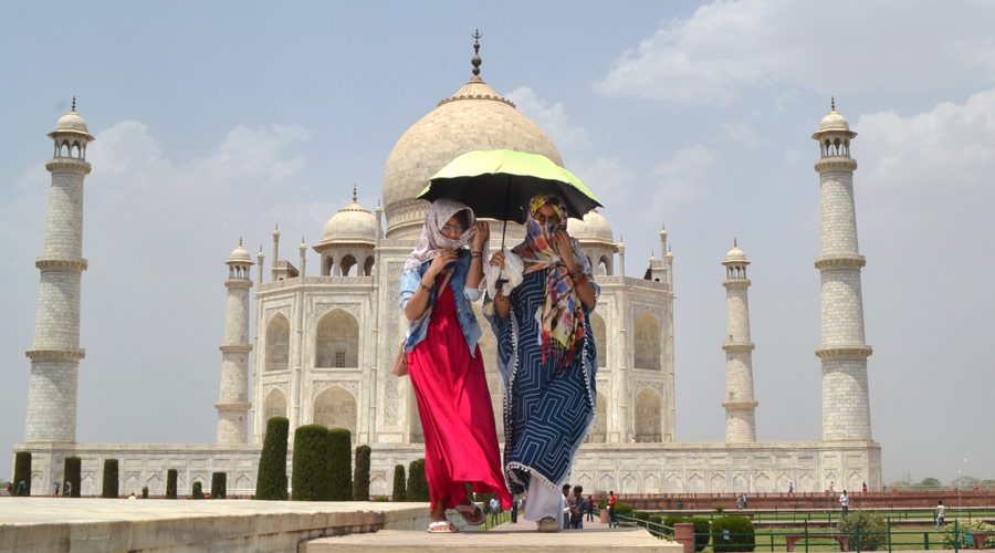 The Taj Mahal sees low footfall of tourists during noon due to the constant scorching heat on a hot summer day, in Agra