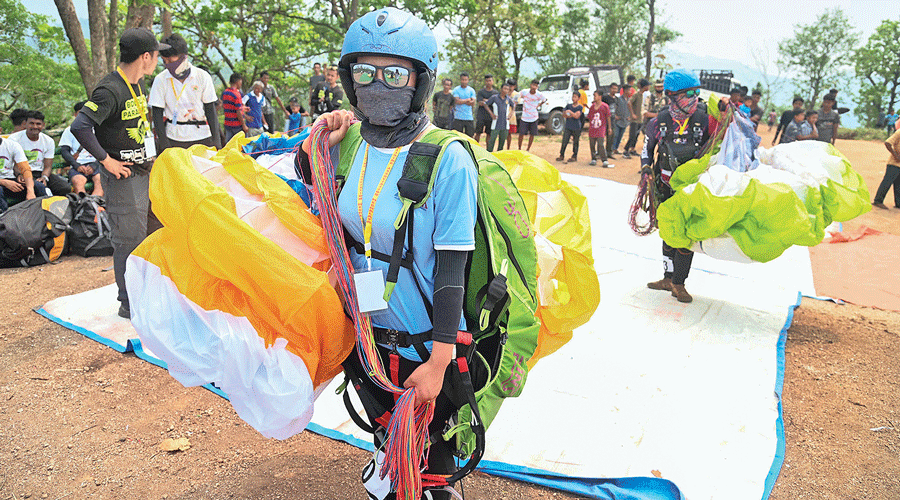 Paragliders take part in the 1st Meghalaya National Paragliding Accuracy Championship 2022.