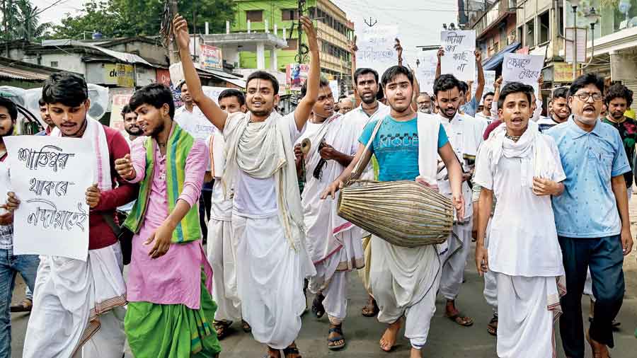 Baishnab devotees perform kirtan at Santipur on Tuesday to protest against the Bengal government’s decision to bifurcate Nadia district