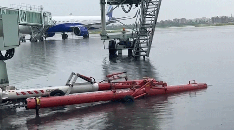 travel | Heavy rain floods Kolkata airport, disrupts flight operations ...