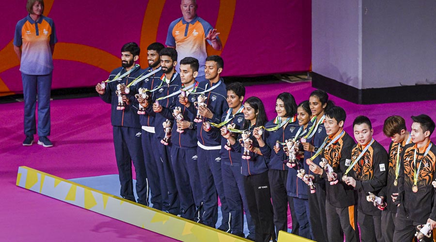 Silver medalist Indian team poses for photographs during the presentation ceremony of the badminton mixed team event, at the Commonwealth Games 2022 (CWG), in Birmingham, UK