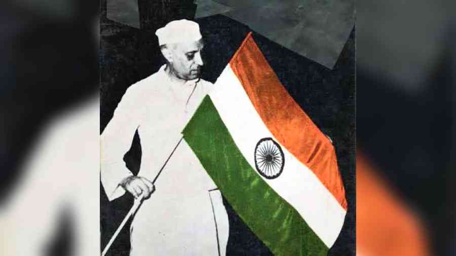 The Congress display picture shows Nehru holding the Tricolour