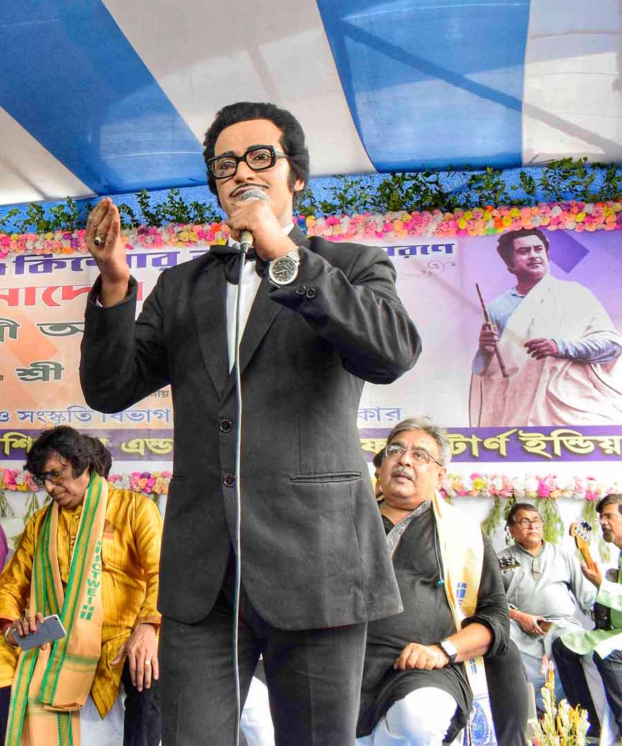 A man dressed as Kishore Kumar at an event celebrating the iconic singer's birth anniversary on Thursday