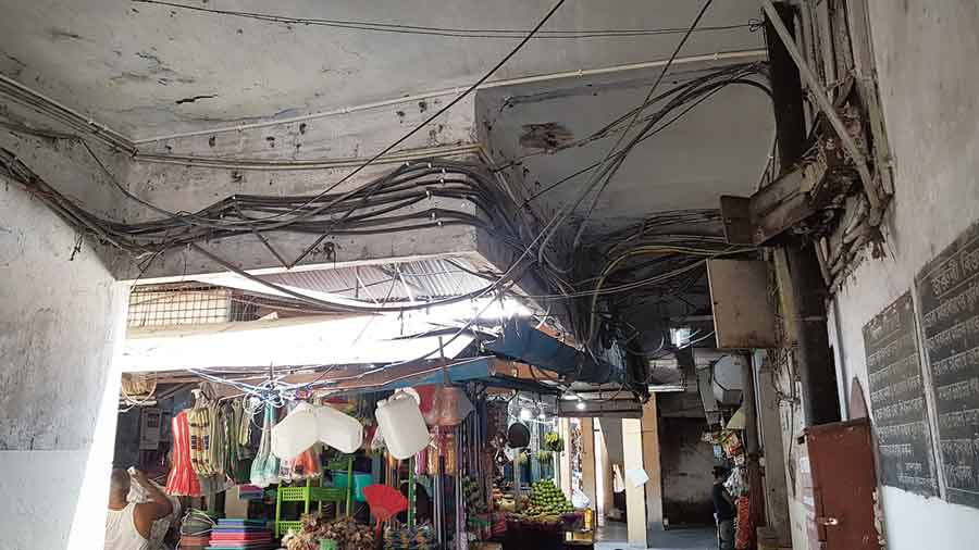Exposed wires hanging from the ceiling of AB-AC Market 