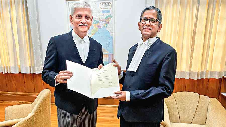 Justice UU Lalit (left) with CJI NV Ramana on Thursday. 