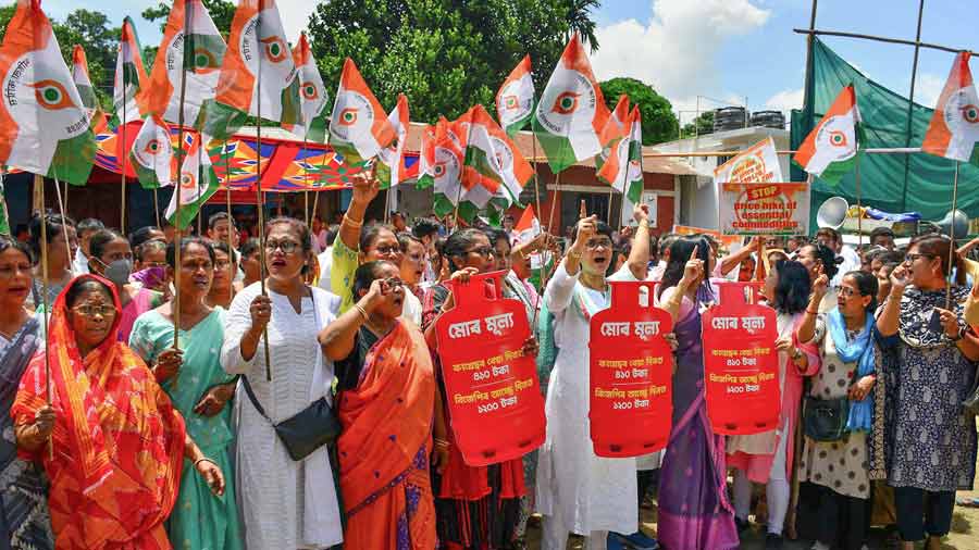 Congress leaders and workers raise slogans during a protest over price rise and GST hike on essential commodities, in Guwahati on Friday