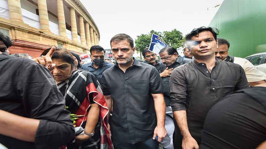 Rahul Gandhi, along with party MPs, marches towards the Rashtrapati Bhavan in New Delhi on Friday as part of the party’s nationwide protest against price rise, unemployment and GST hike on essential items.