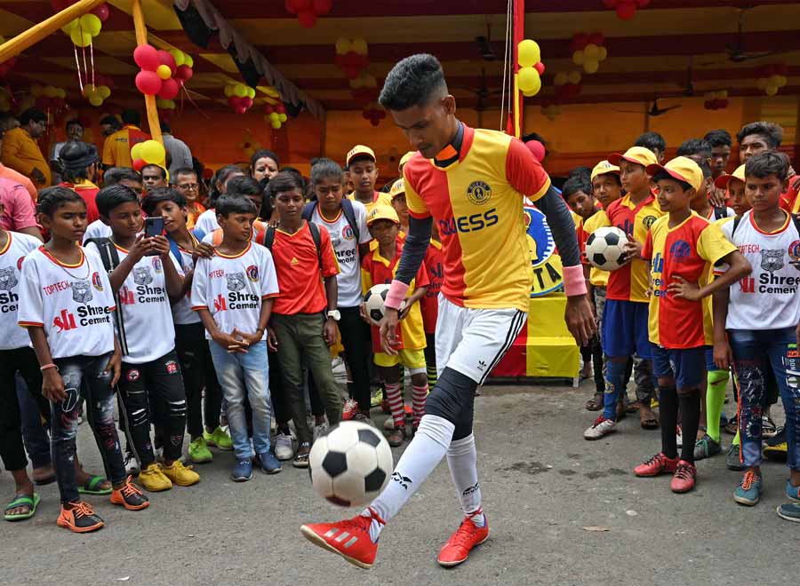 An East Bengal Club supporter puts his dribble skills to test at a programme celebrating the club’s foundation day at Baguiati on Monday, August 1. The Indian football club was established by Suresh Chandra Chaudhuri in 1920.