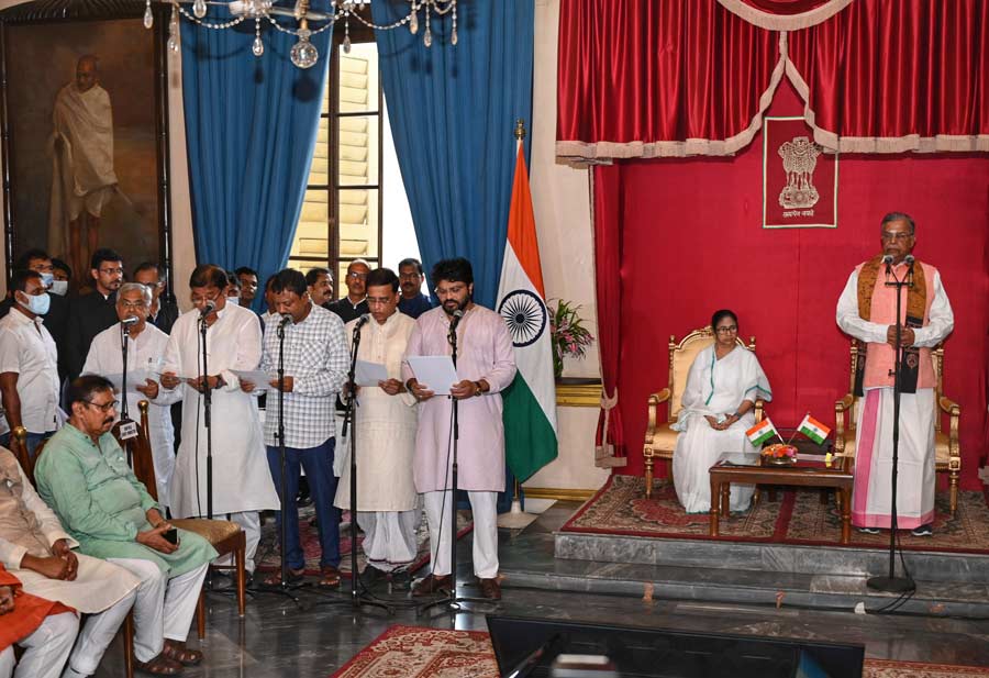 West Bengal Governor La Ganesan leads the swearing-in ceremony of nine new state ministers at Raj Bhavan on Wednesday, August 3. 