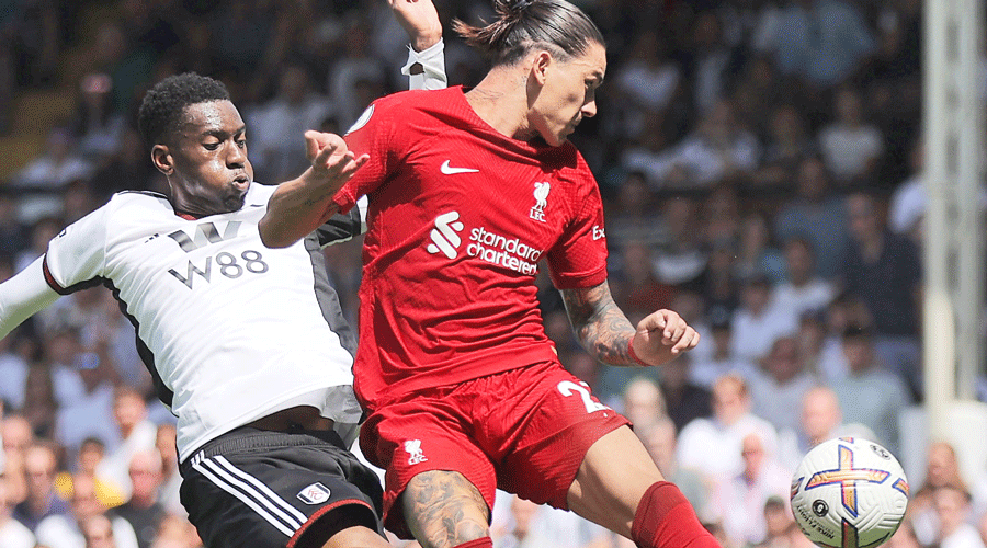 Darwin Nunez (right) scores Liverpool’s first goal against Fulham at Craven Cottage in London on Saturday. 