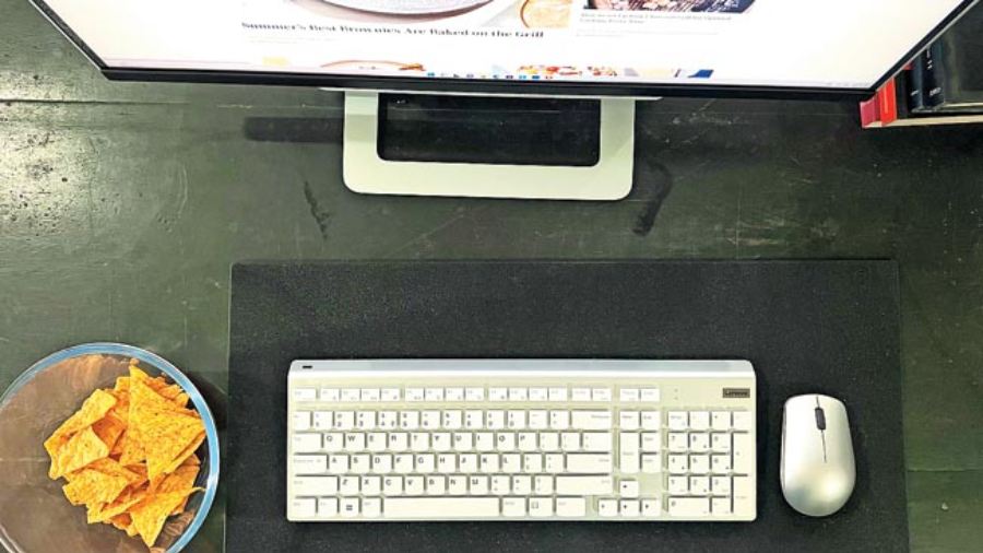 The keyboard and mouse connect via Bluetooth