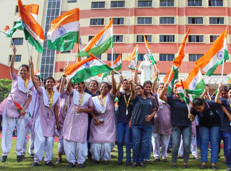 Students of Sister Nivedita University in New Town wave the Tricolour as part of the ‘Har Ghar Tiranga’ celebrations on Monday. ‘Har Ghar Tiranga’ (Tricolour in every house) is an initiative taken by the central government, encouraging people to hoist the National Flag in every household from August 13 to 15