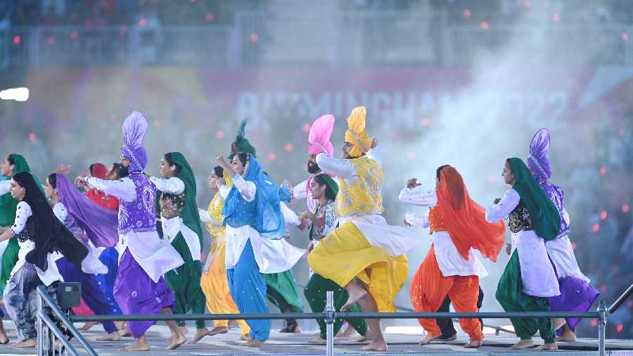Bhangra artists perform during the closing ceremony of the Commonwealth Games 2022, at Alexander Stadium in Birmingham, UK, Monday