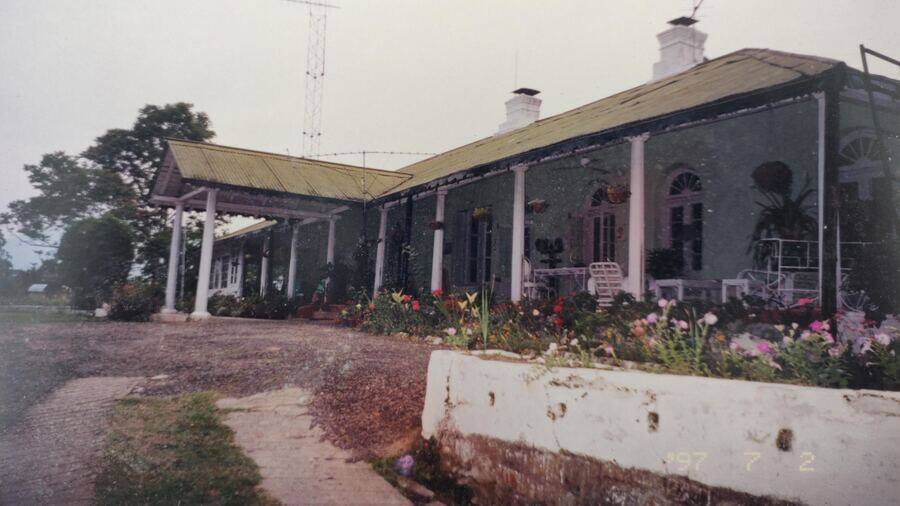 A photograph of The Burra Bungalow at Glenburn Tea Estate from 1997, before the building was restored into the luxury boutique hotel that it is today. The idea was inspired by French wineries that have chateaus for visitors to reside in. Only this one, near Darjeeling, would offer tea and tea experiences! Glenburn is sprawled across 1,600 acres, of which 780 acres is tea plantation and the rest is villages and reserved forest