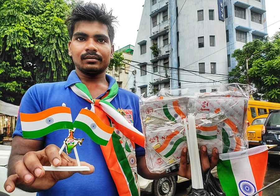 A man selling the Tricolour near Kankurgachi on Thursday ahead of August 15. India will celebrate its 75th Independence Day on Monday.