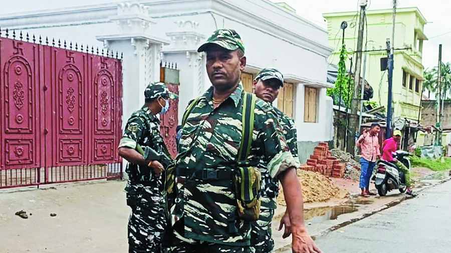 Paramilitary personnel near Birbhum district Trinamul Congress president Anubrata Mondal’s house  in Bolpur on Thursday. 