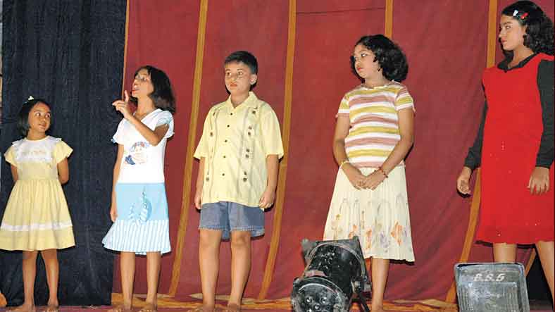 A drama at EC Block’s 2005 puja. Music and theatre were a passtime for early residents  