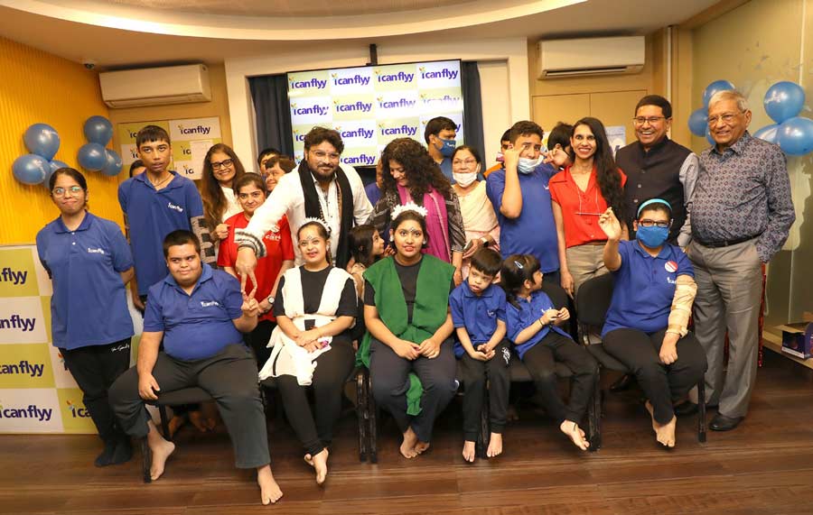 State minister Babul Supriyo celebrates Raksha Bandhan along with students of ICanFlyy at the institute on Friday.