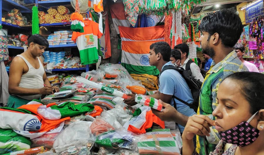 People throng a shop on Canning Street to buy the Tricolour on Saturday. There has been a huge demand for the Tricolour in the run-up to Independence Day in Kolkata. Several traders have been out of stock.