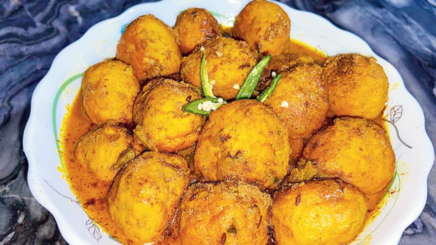 The British were responsible for popularising the potato — the chief ingredient of the dum aloo (top) — that was brought in by the Portuguese as well the orange carrot with which gajar ka halwa (below) is made
