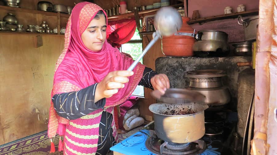 Tabassum brews a cup of noon chai for the writer