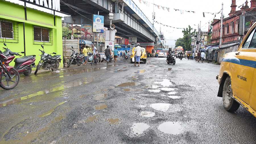 Potholes on a road near the Kidderpore crossing