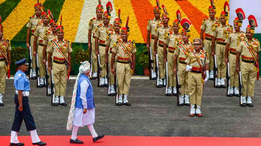 Prime Minister Narendra Modi inspects the guard of honour before addressing the nation on the occasion of the 75th Independence Day celebrations at the Red Fort.