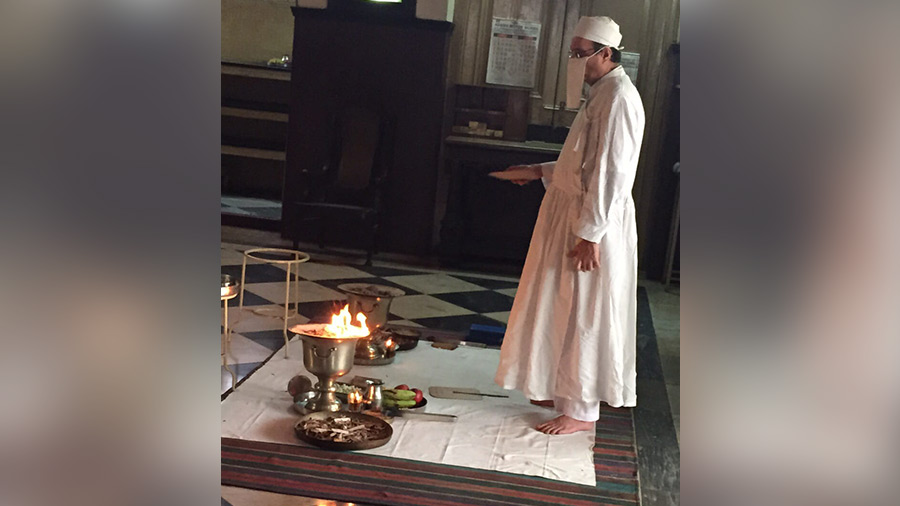 Jashan or religious thanksgiving ceremony in progress at Zoroastrian Anjuman Atash Adaran fire temple