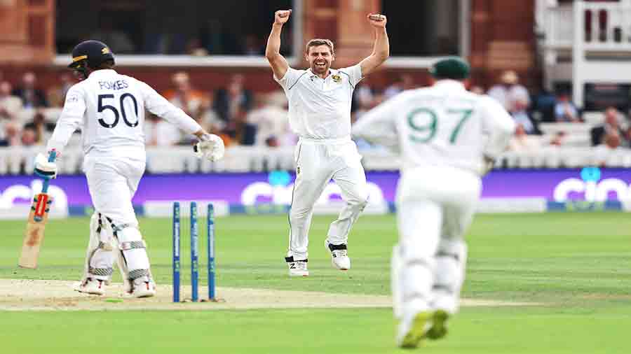 Anrich Nortje of South Africa celebrates after dismissing England’s Ben Foakes on the opening day of the first Test against South Africa