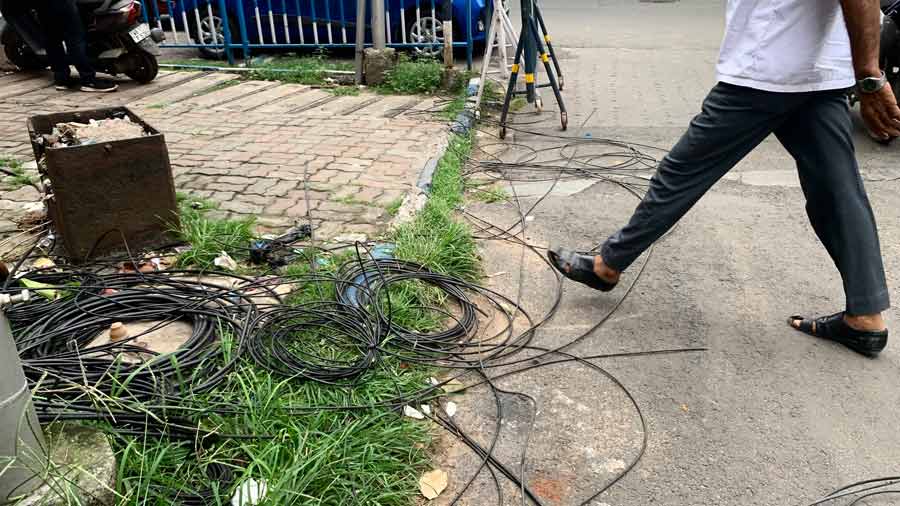 Discarded and tangled wires on a pavement somewhere in the city on Thursday.