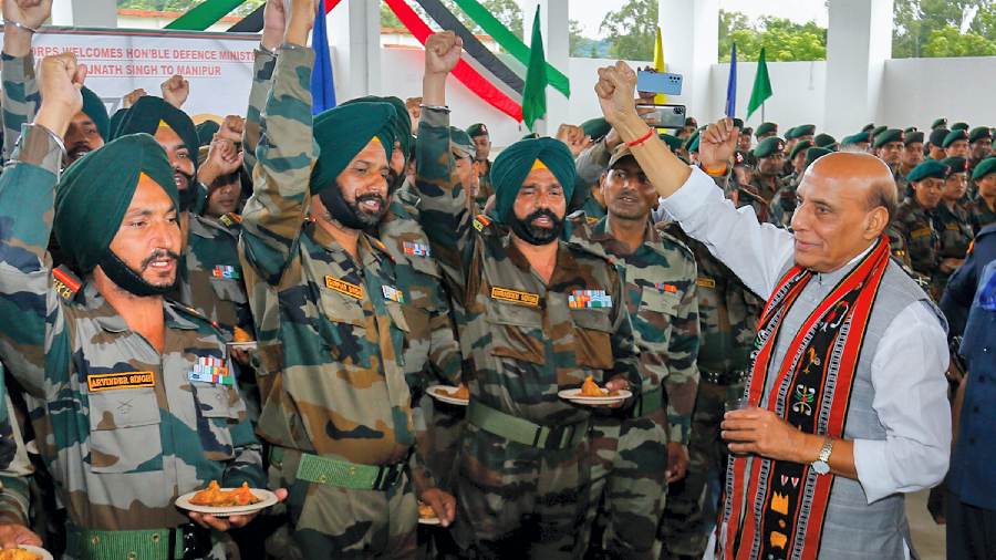 Rajnath Singh with troops of Red Shield Division and Assam Rifles during his visit to Headquarters Inspector General Assam Rifles (South) at Mantripukhri in Imphal
