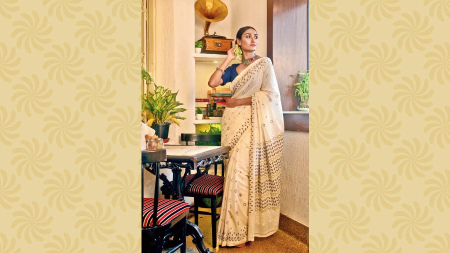 Jamdani sari of 300 count, woven with natural indigo. It has threadwork all over the body, borders and pallu and took four months to weave. Price: Rs 45,000