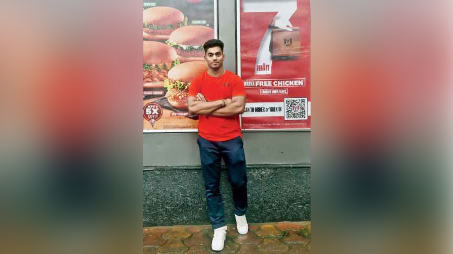The many moods of Commonwealth Games gold medallist weightlifter Achinta Sheuli at KFC, Park Street. The young boy from Howrah treated himself to a KFC spread post his win. 