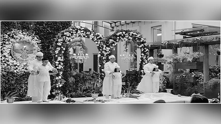 The navjote ceremony of Prochy’s three grandchildren, through which an individual is inducted into the Zoroastrian religion. Reproduced with permission from 'Who is a Parsi?' by Prochy N Mehta, published by Niyogi Books