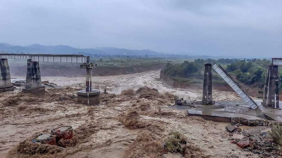 Collapsed portion of railway bridge over the Chakki river in Dharamshala