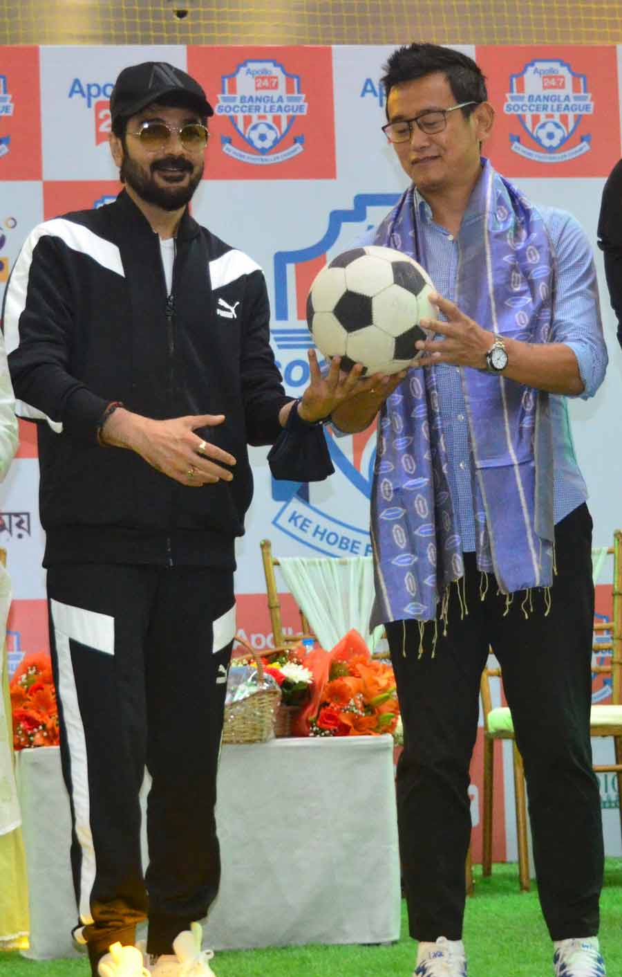 (From left) Actor Prosenjit Chatterjee and former India football team captain Bhaichung Bhutia at the inauguration of ‘Apollo 24|7 BANGLA SOCCER LEAGUE - Ke Hobe Footballer Champ’ at South City Mall on Monday.