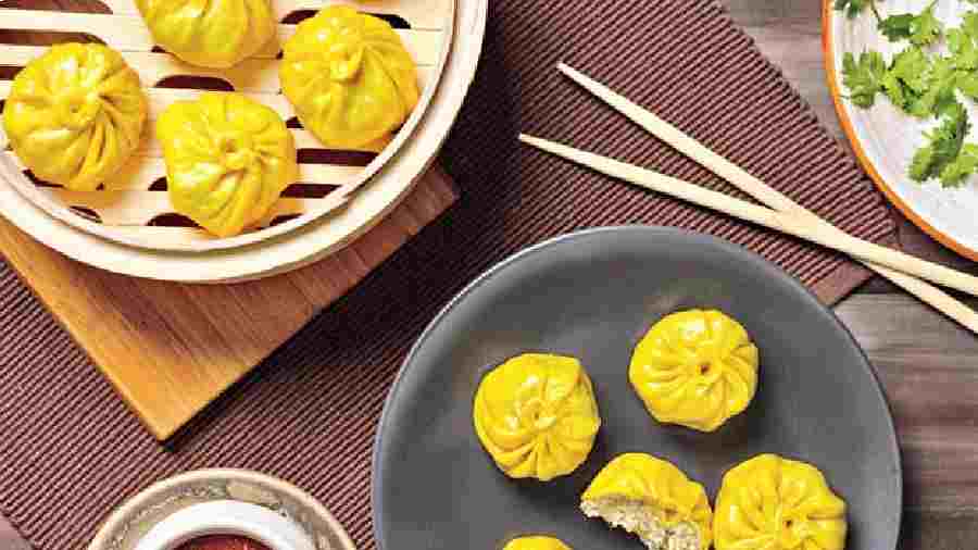 Chicken Cheese Steamed Momos: Soft and juicy momos are stuffed with seasoned chicken, which is then topped with a cheesy burst. Rs 160-plus