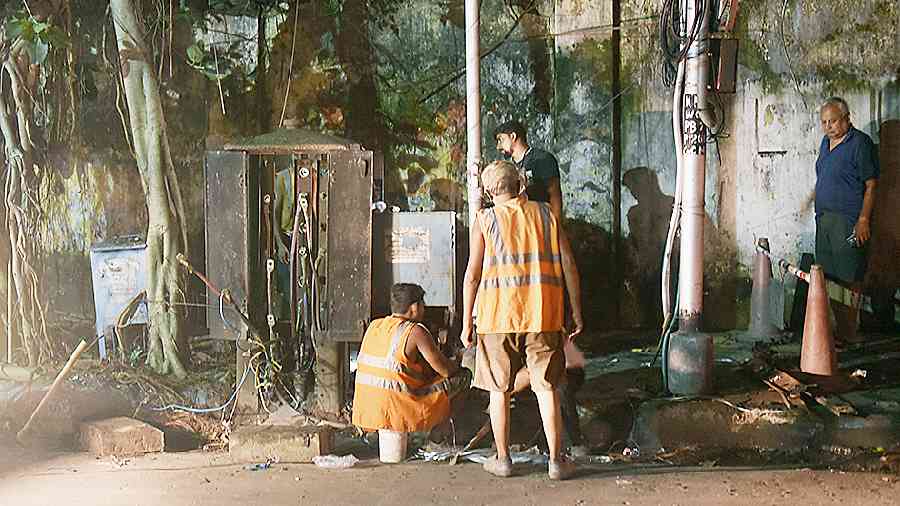 An electrical distribution box being repaired in Ballygunge on Tuesday. 