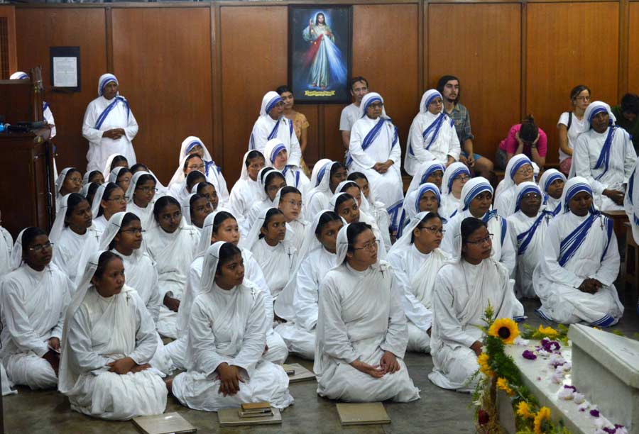 Nuns of the Missionaries of Charity at a prayer session to commemorate the 112th birth anniversary of Mother Teresa at Mother House on AJC Bose Road in central Kolkata on Friday. Mother Teresa, also known as the Saint of the Gutters, was awarded the Nobel Peace Prize in 1979 for dedicating her life to the well-being of the poor.