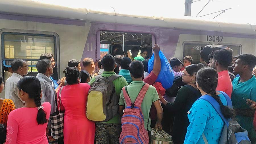 The trains back to Kolkata are packed with customers and their stacks of saris on haat days