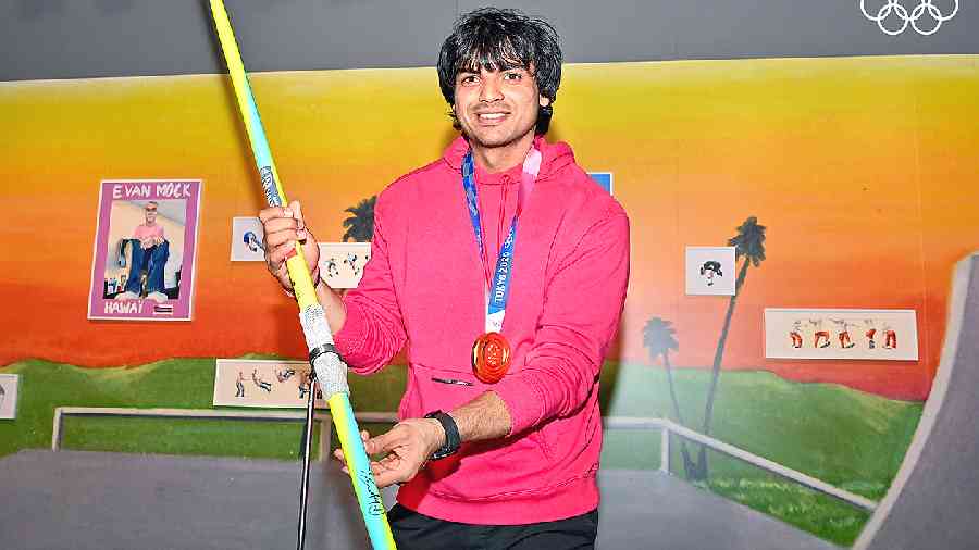 Neeraj Chopra with his Tokyo Olympic Games javelin at the Olympic Museum in Lausanne on Saturday. Neeraj gifted his javelin to the museum. India’s only other individual Olympic gold medallist — shooter Abhinav Bindra — was also present for the occasion. 