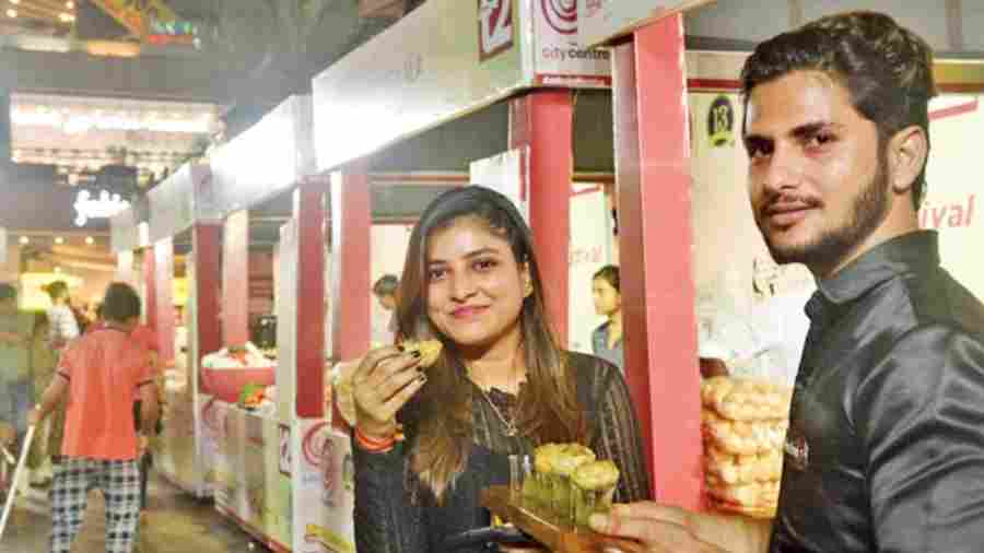 Shreya Jain (Left) posed with Phuchka Shots and said: “This is my favourite of all! I love the unique concept and it is fun to eat the other chaats”