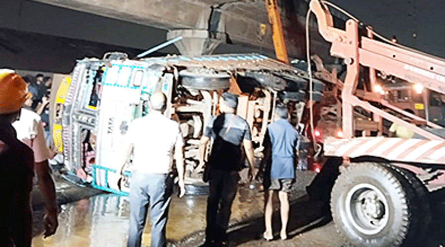 The truck being shifted from the site of the accident that killed Ward 79 councillor Ram Pyare Ram’s 35-year-old son, Ram Kinkar Ram, on Saturday night.