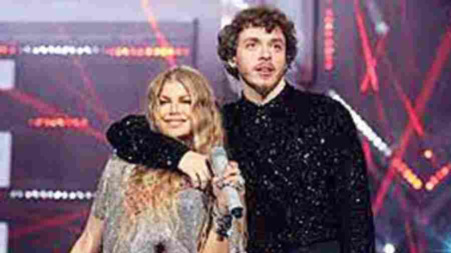 Air Play: Getting the evening started were Jack Harlow and Fergie... well, kind of. The performance took place in the middle of an aeroplane set, which makes sense as he sang his single First Class. Dressed as an air steward, he welcomed celeb passengers like Lil Nas X, Avril Lavigne and Chloe Bailey. The surprise at the end of the show was when Fergie made an appearance, singing a part of her song Glamorous. Although the host for the evening, Jack (and Lil Nas X) won the coveted VMA Moon Person statue for Best Collaboration, Best Art Direction and Visual Effects for their hit Industry Baby. Harlow also won the Song of the Summer award for First Class.