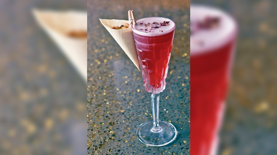 Lock and Key: Open up your mind with this delicious cranberry, raspberry and gin-based sip with a dash of lemon and garnished with lemonade and rose petals.